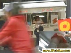 Asian waitress is giving upskirt panty shots while at work