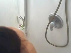 hot Japanese stepmom spied in the shower