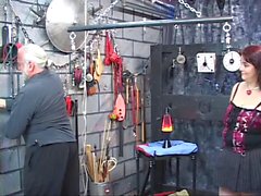 Dark-haired fat bitch restrained and humiliated in BDSM lair