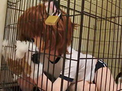 Kigurumi dog in cage, bondage and breathplay.