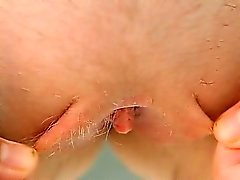 Shaving her amazingly angular pussy