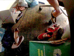 Shoe, under desk, candid feet