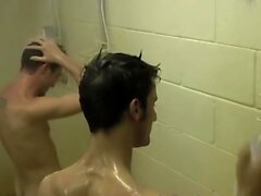 Athletic jocks wank their hard dicks in warm shower