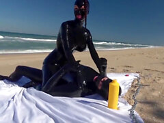 Pareja de látex, catsuit de látex, buceo