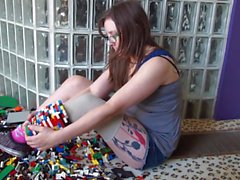 Amputee girl makes leg out of lego (non nude)